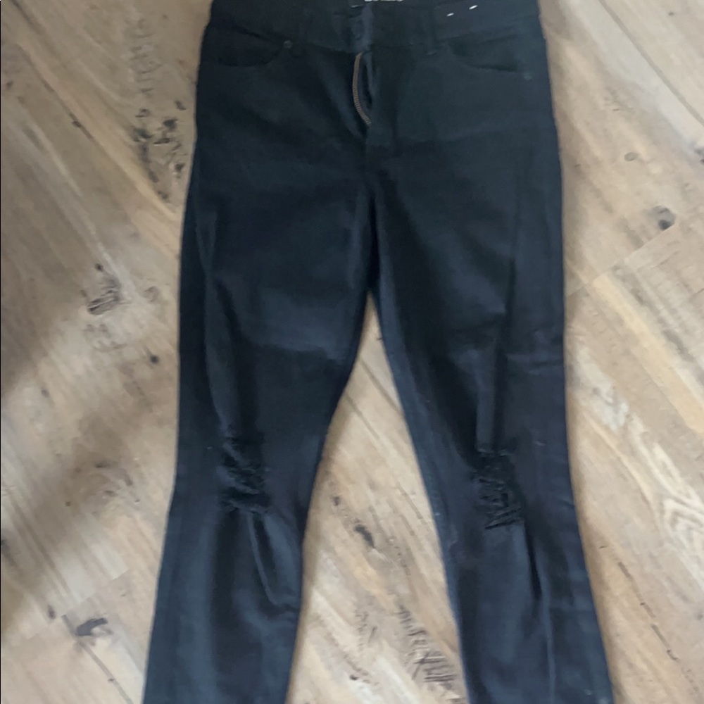 Express skinny jeans with knee holes size 4